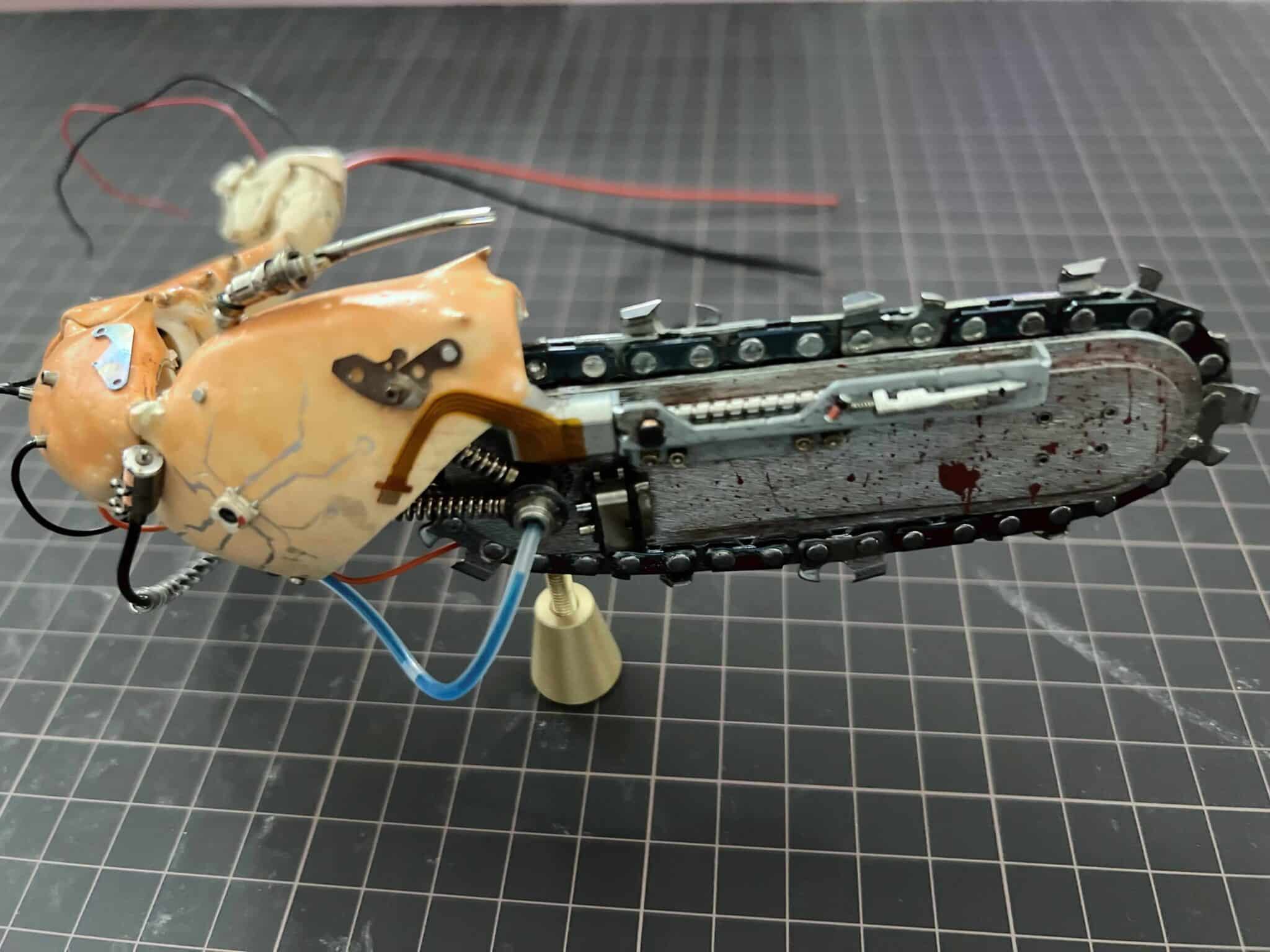 chainsaw crab pincer scaled